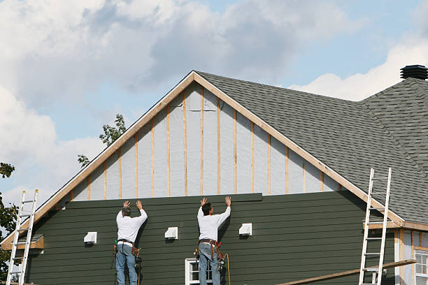 Professional Storm Damage Siding Repair technician working in Belmar, NJ